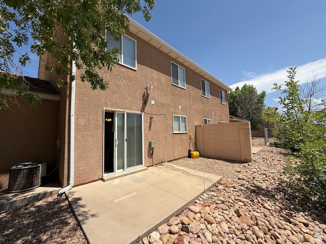 1087 N 1800th Cir W, St George, UT 84770 - back of house featuring central AC, a patio area, and stucco siding