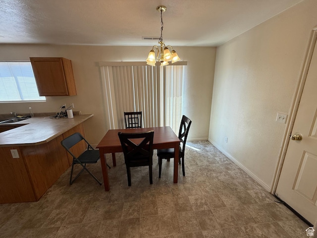 1087 N 1800th Cir W, St George, UT 84770 - dining room featuring a chandelier and baseboards
