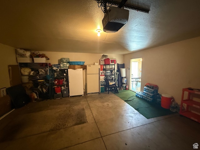 1087 N 1800th Cir W, St George, UT 84770 - garage with freestanding refrigerator and a garage door opener