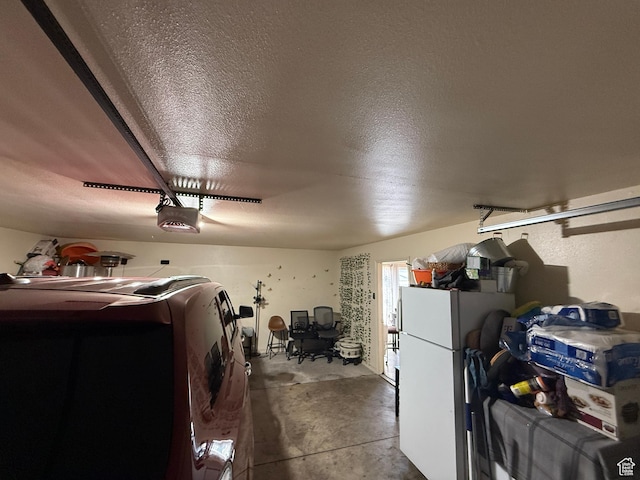 1087 N 1800th Cir W, St George, UT 84770 - garage with a garage door opener and freestanding refrigerator