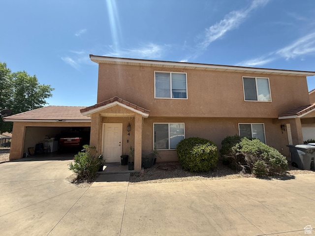 1087 N 1800th Cir W, St George, UT 84770 - multi unit property featuring an attached garage, stucco siding, and concrete driveway
