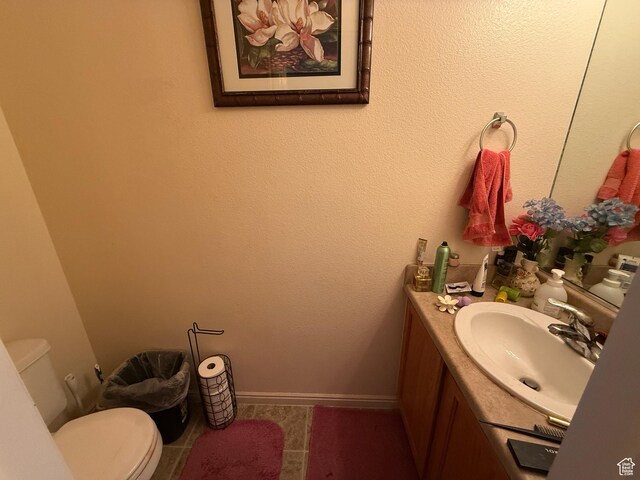 1087 N 1800th Cir W, St George, UT 84770 - bathroom with toilet, vanity, and tile patterned flooring