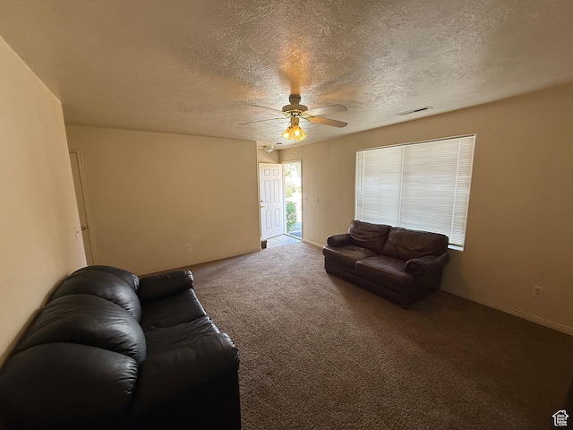 1087 N 1800th Cir W, St George, UT 84770 - living room with a ceiling fan, a textured ceiling, carpet flooring, and baseboards