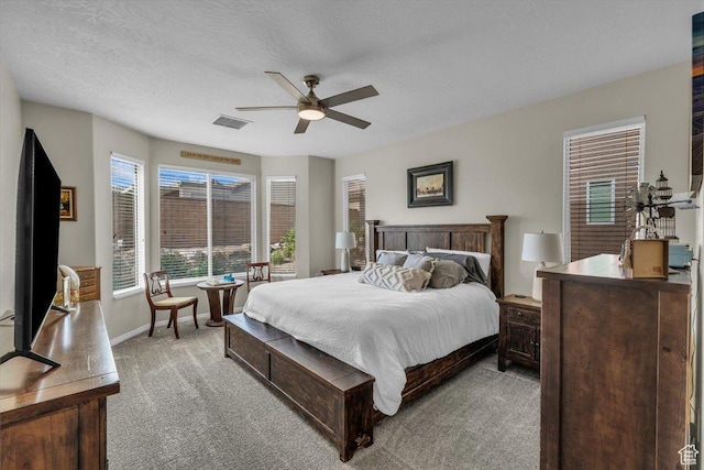 1646 W Sunkissed Dr, St George, UT 84790 - bedroom featuring light colored carpet, baseboards, and a ceiling fan