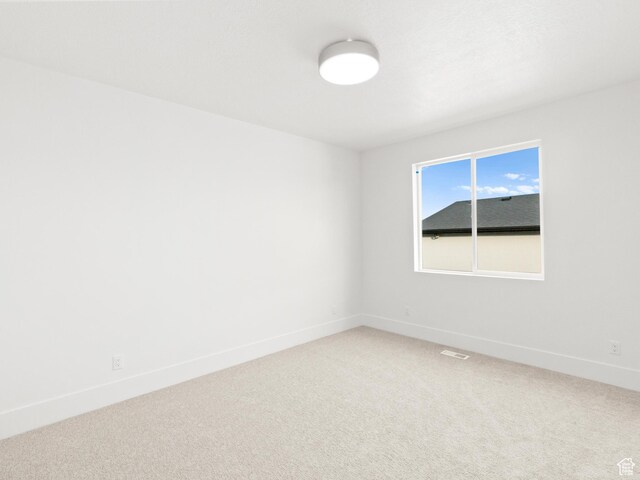 7272 W Summit Crest Cir, Herriman, UT 84096 - unfurnished room with light carpet and baseboards