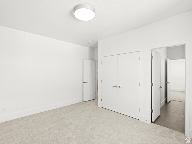 7272 W Summit Crest Cir, Herriman, UT 84096 - unfurnished bedroom featuring carpet flooring and a closet