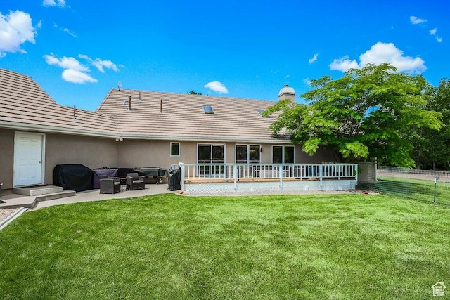 580 S Stagecoach Dr, Brookside, UT 84782 - back of property with an outdoor hangout area, a patio, a chimney, stucco siding, and a tile roof