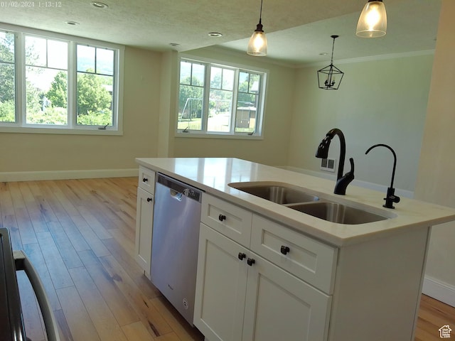 919 E Millbrook Way, Bountiful, UT 84010 - kitchen featuring stainless steel dishwasher, a sink, plenty of natural light, white cabinets, and crown molding