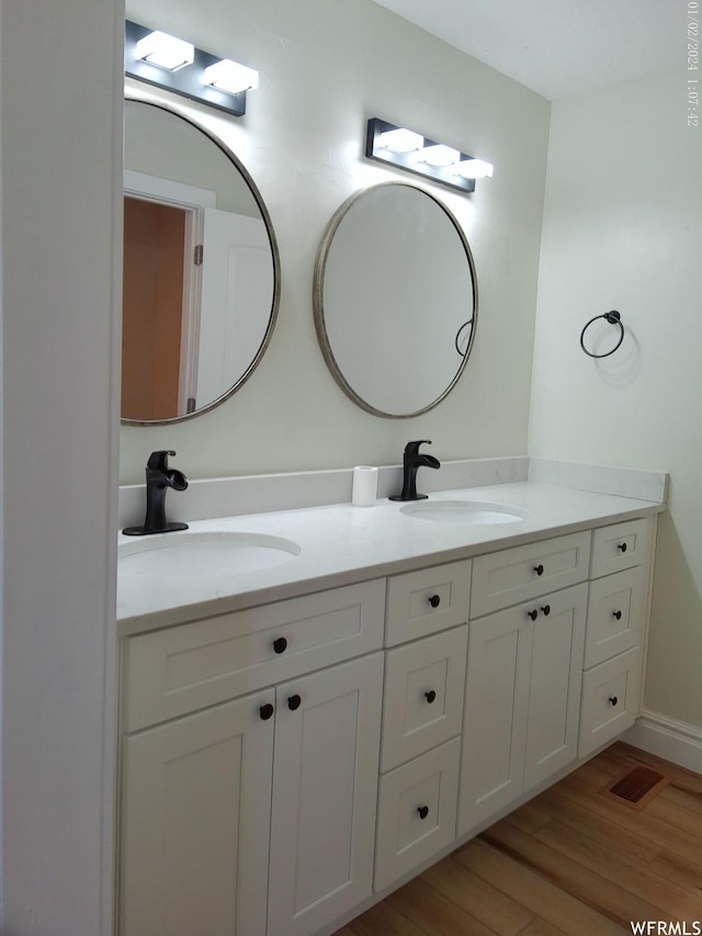 919 E Millbrook Way, Bountiful, UT 84010 - full bathroom featuring double vanity and wood finished floors