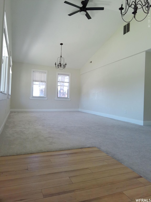 919 E Millbrook Way, Bountiful, UT 84010 - empty room with a chandelier, carpet flooring, baseboards, a ceiling fan, and high vaulted ceiling