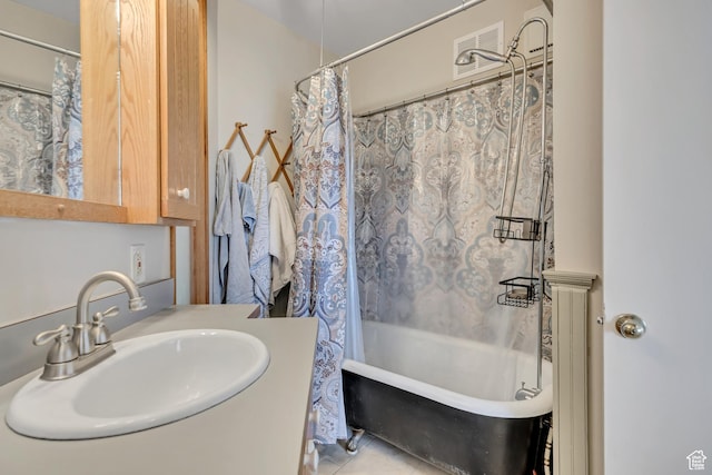 319 N Almond St W # Rear, Salt Lake City, UT 84103 - bathroom with shower / tub combo with curtain, vanity, and tile patterned flooring