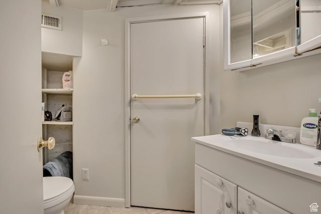 319 N Almond St W # Rear, Salt Lake City, UT 84103 - bathroom with vanity, toilet, and tile patterned floors