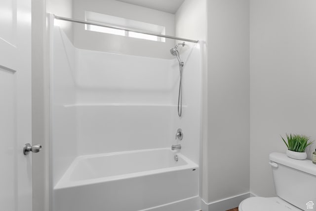 1809 W Terra Vista Ln N Unit B1, Saratoga Springs, UT 84045 - bathroom with toilet, shower / bathtub combination, and baseboards