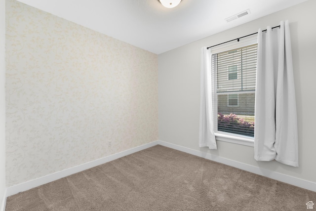 1809 W Terra Vista Ln N Unit B1, Saratoga Springs, UT 84045 - carpeted spare room featuring wallpapered walls and baseboards