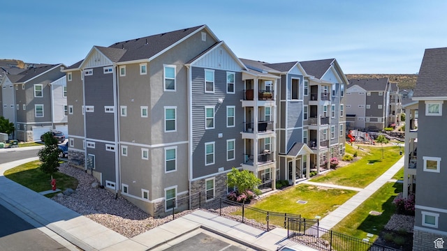 1809 W Terra Vista Ln N Unit B1, Saratoga Springs, UT 84045 - view of property featuring a residential view and uncovered parking