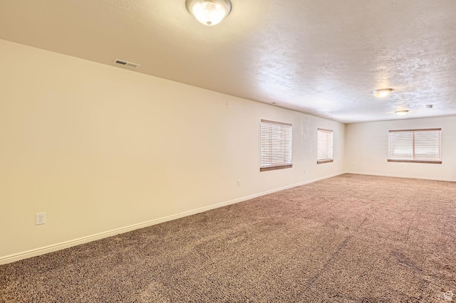 4628 N Long Way, Eagle Mountain, UT 84005 - empty room featuring baseboards, carpet floors, and a textured ceiling