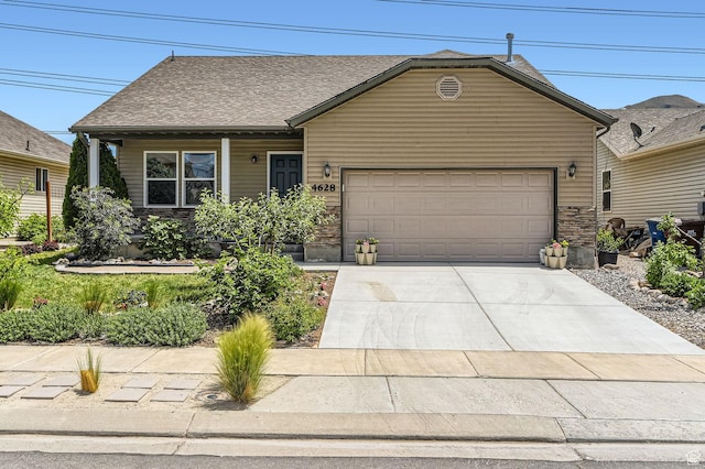 4628 N Long Way, Eagle Mountain, UT 84005 - view of front of property with a garage, driveway, and roof with shingles