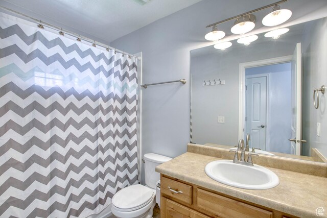 2155 N 170 W, Tooele, UT 84074 - bathroom with vanity, toilet, and a shower with curtain