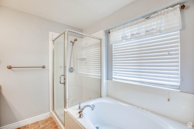 2155 N 170 W, Tooele, UT 84074 - bathroom with a garden tub, a shower stall, and tile patterned flooring