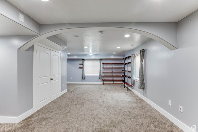 2155 N 170 W, Tooele, UT 84074 - basement featuring carpet flooring, recessed lighting, arched walkways, and baseboards