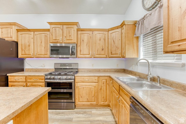 2155 N 170 W, Tooele, UT 84074 - kitchen featuring appliances with stainless steel finishes, light brown cabinetry, and a sink