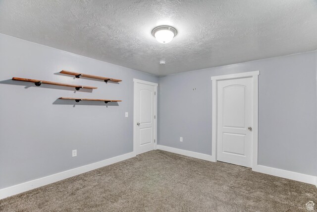 2155 N 170 W, Tooele, UT 84074 - unfurnished bedroom with a textured ceiling, carpet flooring, and baseboards