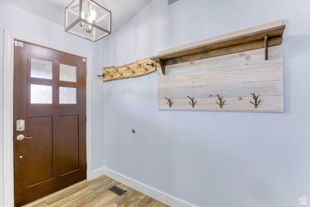 2155 N 170 W, Tooele, UT 84074 - mudroom with light wood-type flooring, baseboards, and a chandelier