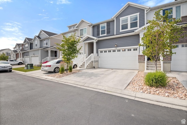 274 W 530 N Unit 329, Vineyard, UT 84059 - townhome / multi-family property with a residential view, an attached garage, and concrete driveway