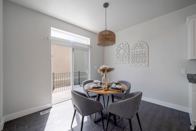 2185 W Crestview Dr, Lehi, UT 84043 - dining area featuring dark wood-style floors and baseboards