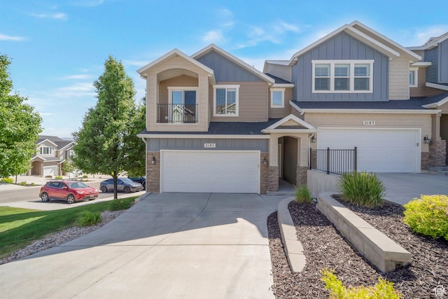 2185 W Crestview Dr, Lehi, UT 84043 - view of front of property with an attached garage, driveway, board and batten siding, and stone siding