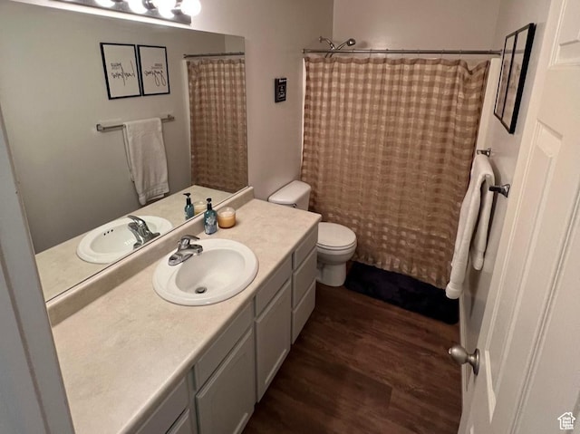 1305 S 1410 E, Provo, UT 84606 - full bathroom featuring wood finished floors, toilet, and vanity