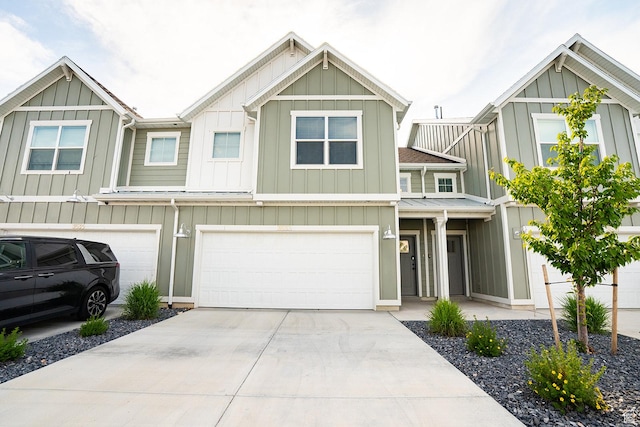 3533 S 4300 W, West Haven, UT 84401 - townhome / multi-family property featuring board and batten siding, concrete driveway, and a garage