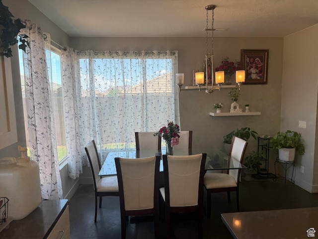 410 N 2720 E, St George, UT 84790 - dining area featuring healthy amount of natural light, baseboards, and concrete flooring