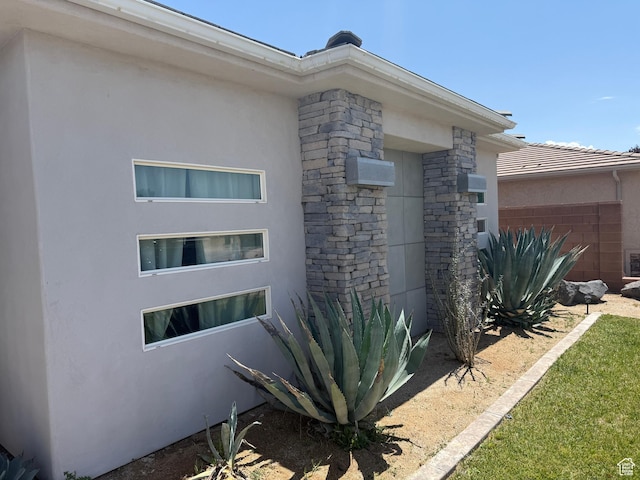410 N 2720 E, St George, UT 84790 - view of side of home with stucco siding and stone siding