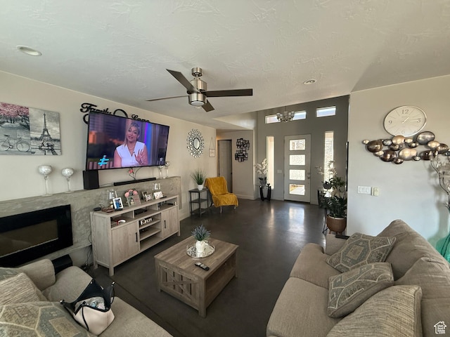410 N 2720 E, St George, UT 84790 - living room with a ceiling fan and a fireplace