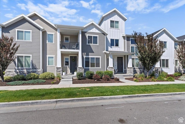 1252 W Cinch Way S, Bluffdale, UT 84065 - multi unit property with a balcony, stone siding, and board and batten siding