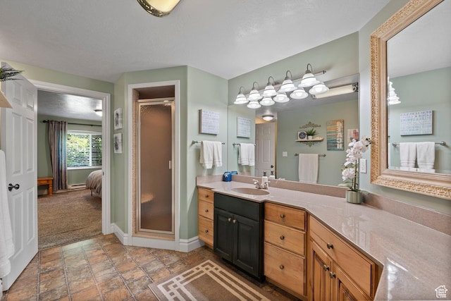 8149 S 2425 E, South Weber, UT 84405 - full bathroom featuring vanity, a stall shower, ensuite bath, and stone finish floors