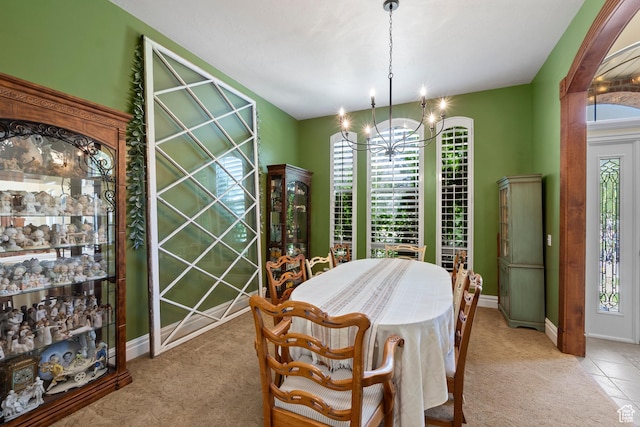 8149 S 2425 E, South Weber, UT 84405 - dining room featuring light carpet, a chandelier, and plenty of natural light