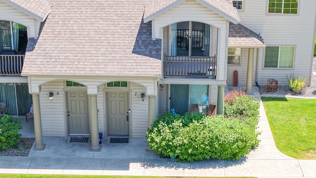 2515 W 450 S Unit 7, Springville, UT 84663 - view of exterior entry featuring roof with shingles and a balcony