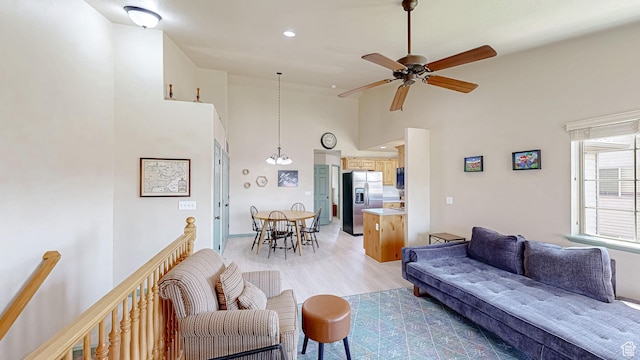 2515 W 450 S Unit 7, Springville, UT 84663 - living area with light wood-style floors, ceiling fan, high vaulted ceiling, and recessed lighting