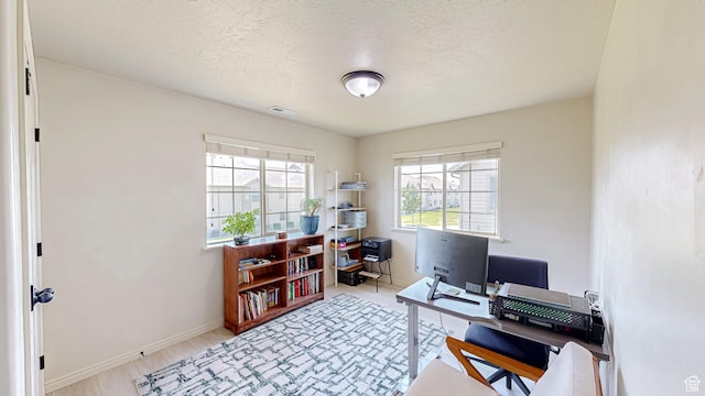 2515 W 450 S Unit 7, Springville, UT 84663 - office area featuring baseboards, a textured ceiling, and wood finished floors