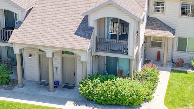 2515 W 450 S Unit 7, Springville, UT 84663 - property entrance featuring a shingled roof and a balcony