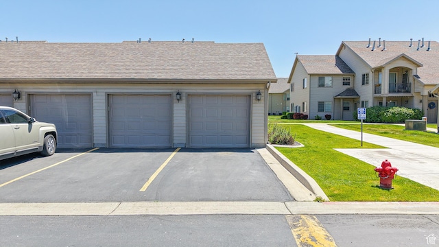 2515 W 450 S Unit 7, Springville, UT 84663 - view of front facade featuring a front lawn and community garages