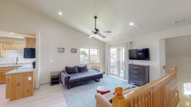 2515 W 450 S Unit 7, Springville, UT 84663 - living area with vaulted ceiling, a ceiling fan, recessed lighting, light wood-type flooring, and baseboards