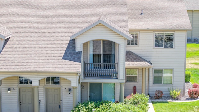 2515 W 450 S Unit 7, Springville, UT 84663 - view of front of home featuring roof with shingles, a balcony, and central air condition unit