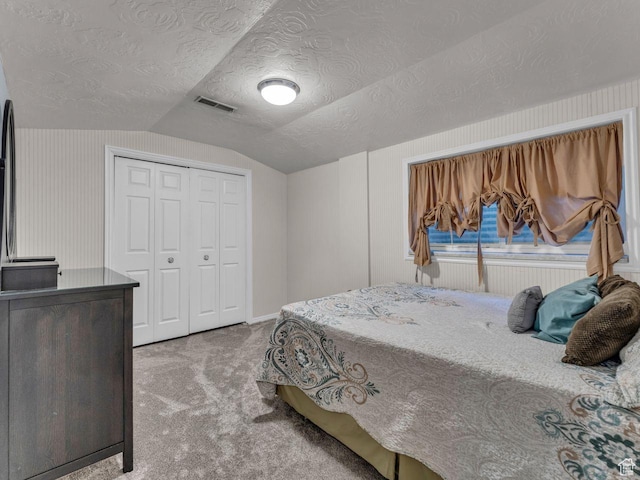 6386 S Lombardy Dr, Cottonwood Heights, UT 84121 - bedroom with carpet floors, lofted ceiling, a textured ceiling, and a closet