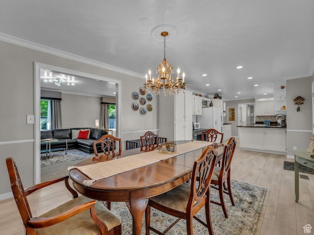 6386 S Lombardy Dr, Cottonwood Heights, UT 84121 - dining area featuring a chandelier, recessed lighting, light wood finished floors, and crown molding