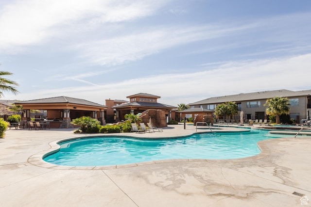 266 N 2020 W # 74, Hurricane, UT 84737 - community pool featuring a gazebo and a patio