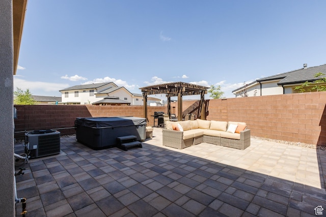 266 N 2020 W # 74, Hurricane, UT 84737 - fenced backyard featuring central AC unit, a pergola, a patio area, outdoor lounge area, and a hot tub