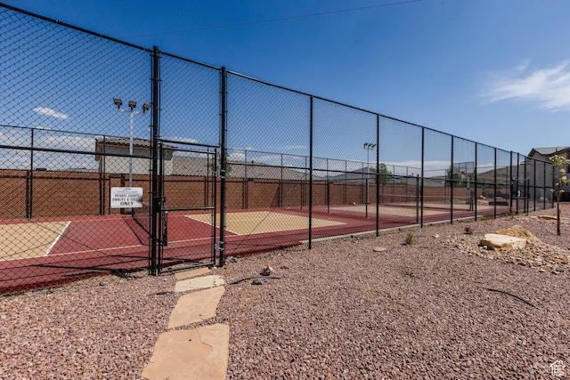 266 N 2020 W # 74, Hurricane, UT 84737 - view of tennis court with a gate